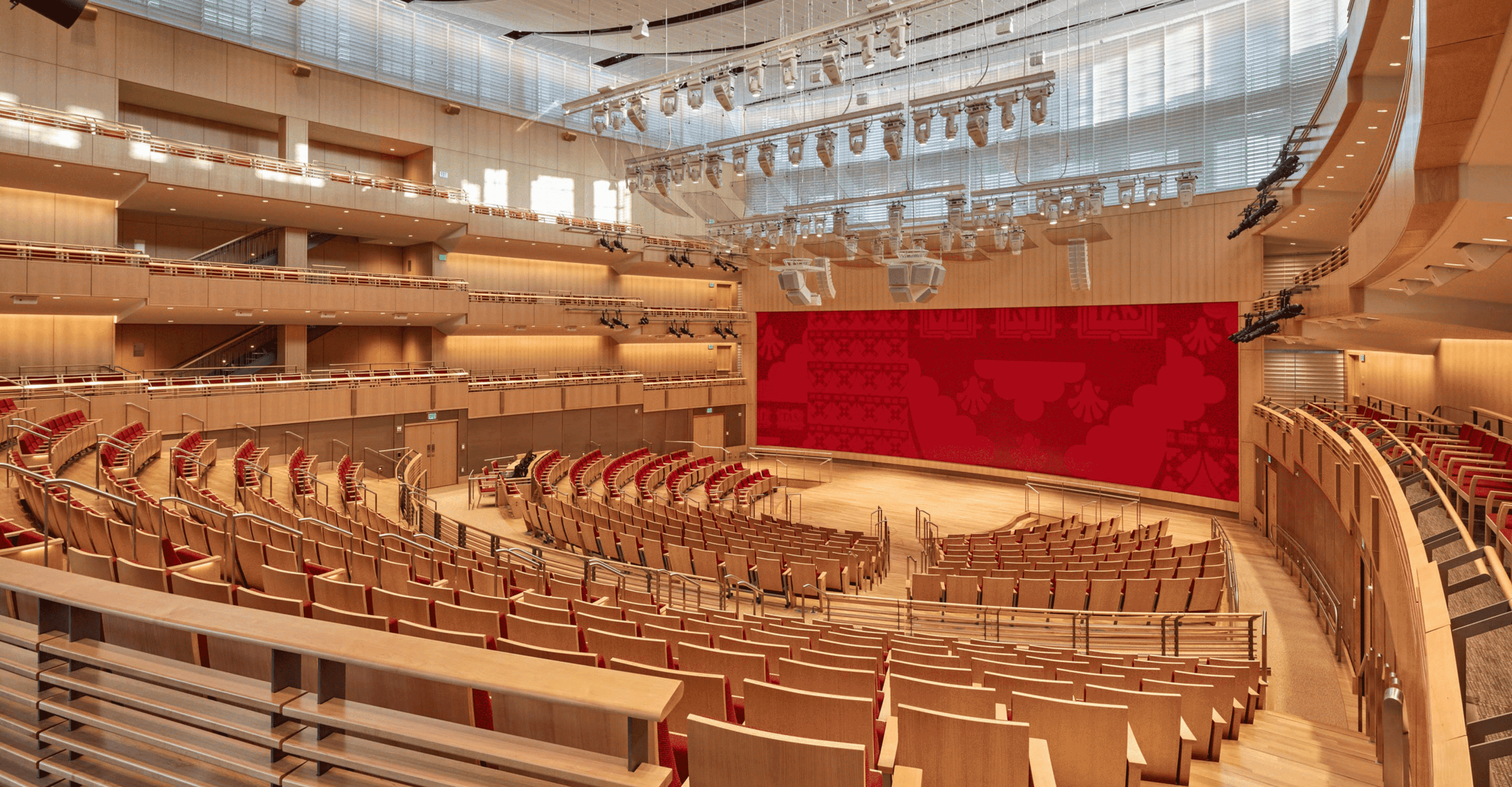 Harvard Klarman Hall featuring wood acoustic wall panels