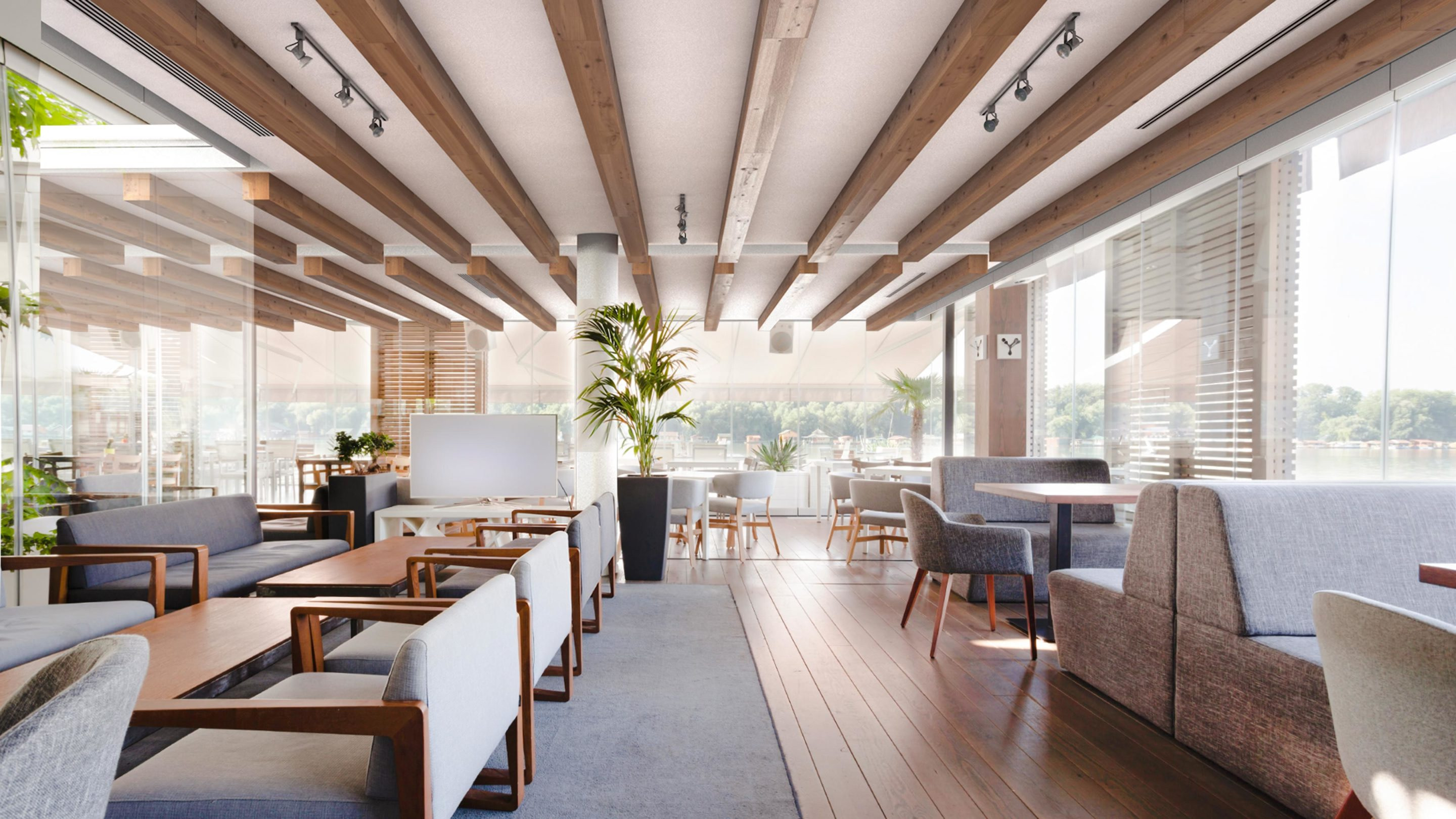 Neutral toned restaurant showcasing wood acoustic beams on the ceiling.